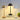 Scandinavian design table lamp with a sleek wooden base, soft ambient light, and a minimalist aesthetic, placed next to a potted houseplant on a modern interior table.