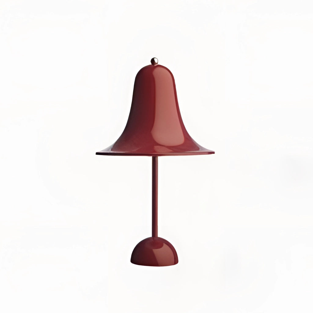 Rechargeable LED lamp with touch sensor in a red wine color, placed on a wooden table, featuring a cylindrical lampshade and sleek design.