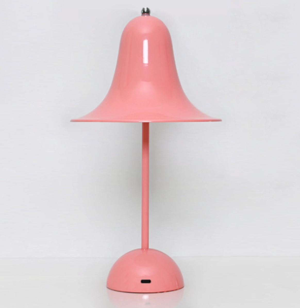 Rechargeable LED lamp with touch sensor in red color, featuring a sleek design suitable for modern interior decor.