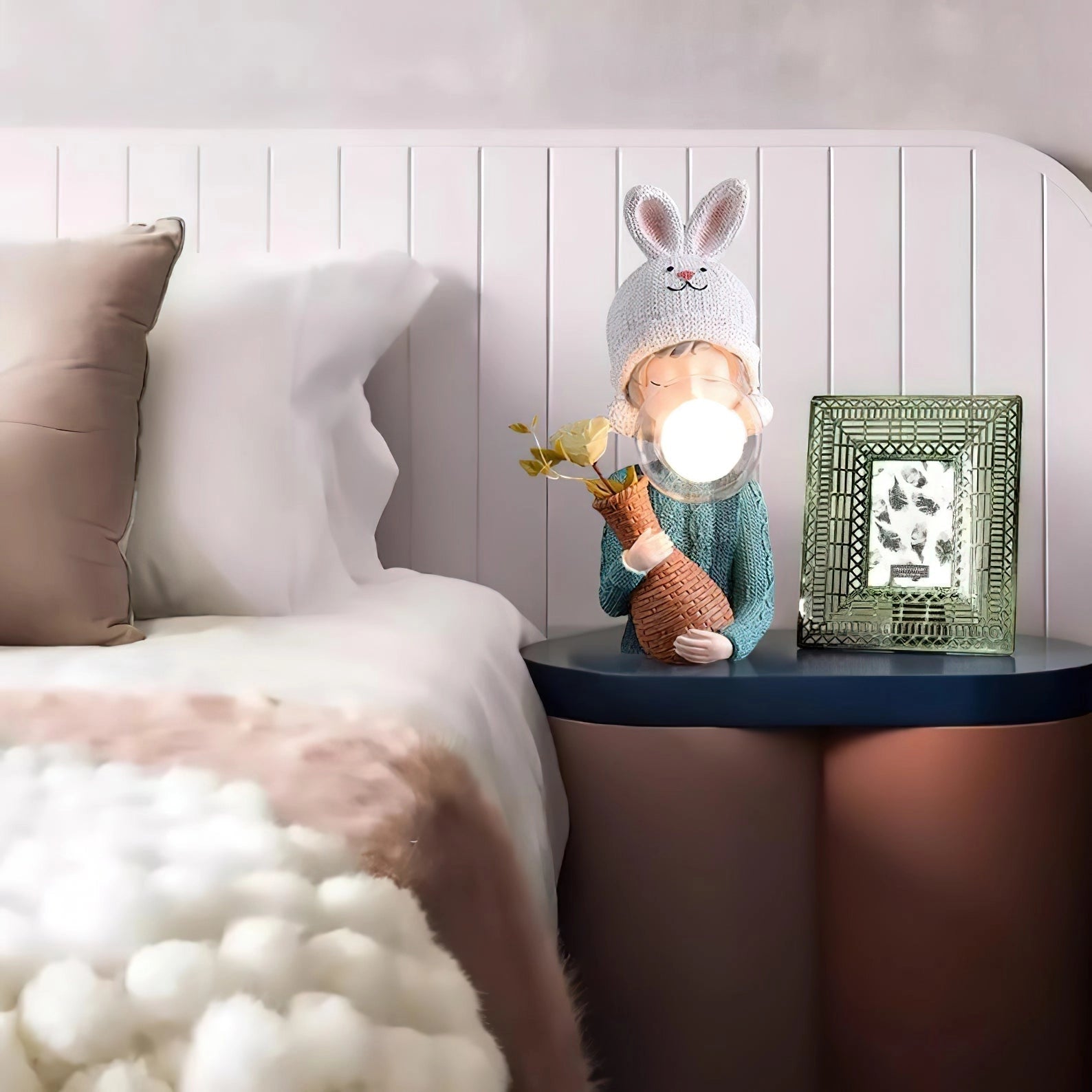 Resin table lamp featuring an elegant rabbit girl with a dual glass lampshade, positioned in a cozy room setting.