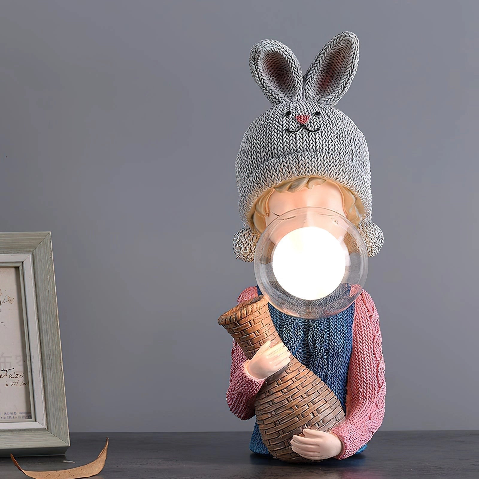 Resin table lamp depicting an elegant rabbit girl holding dual glass lampshades, showcasing intricate details and a whimsical design.