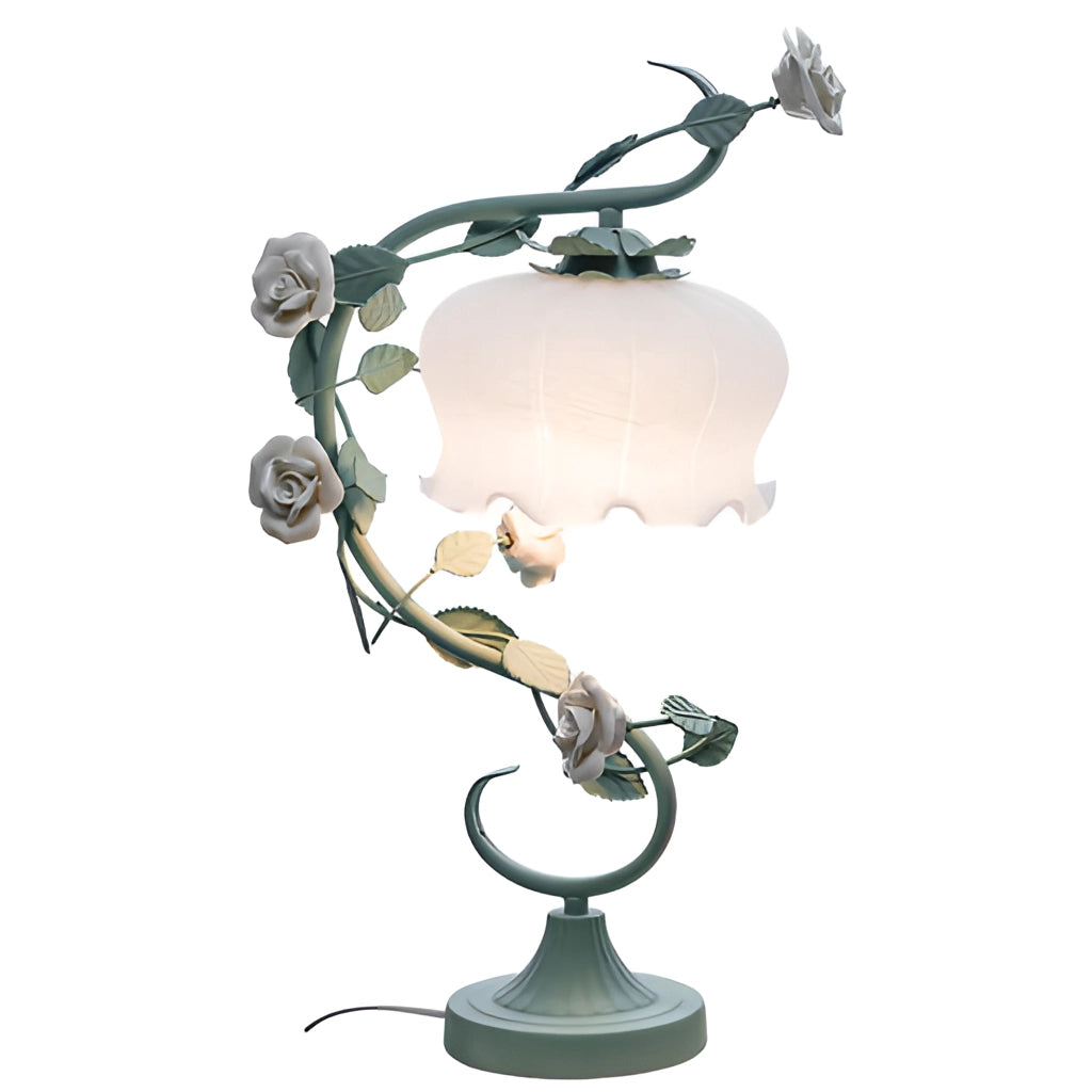 Elegant Rose Encased Table Lamp with Floral Design and Metal Base on a Table