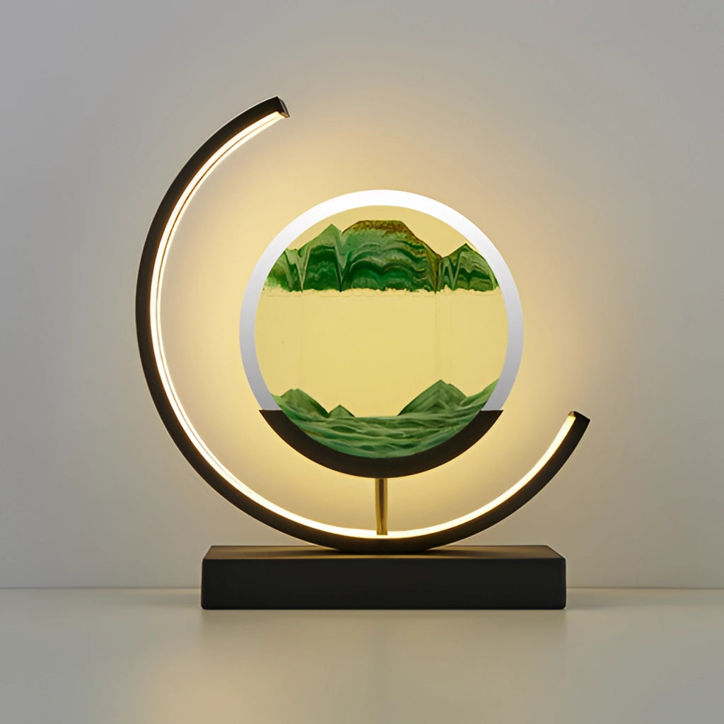 A green and black rectangular LED table lamp featuring dynamic 3D sand art, showcasing intricate sand painting designs.
