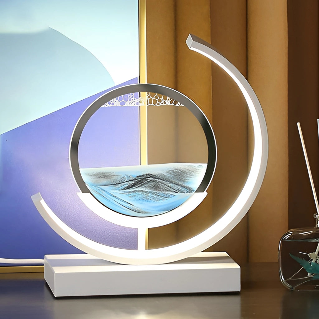 Sand Art LED Table Lamp with dynamic 3D sand painting light, featuring a sleek, modern design with a circular base and glass display.