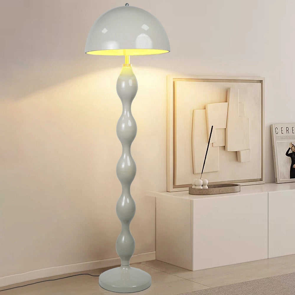 Scandinavian LED floor lamp in mud gray with adjustable brightness, featuring a sleek Nordic style design, standing in a modern interior with wooden flooring and minimalist decor.
