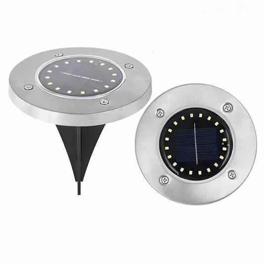 Solar pathway disk lights in white, set of 8, each with 8 LEDs, IP65 waterproof, designed to auto-on from dusk to dawn.