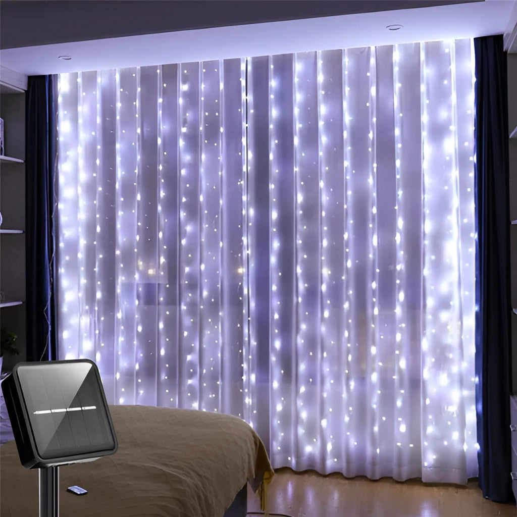 Outdoor Solar String Light Curtain in White, featuring 300 LEDs across a 9ft x 9ft area, illuminating a cozy living room with soft, ambient lighting.