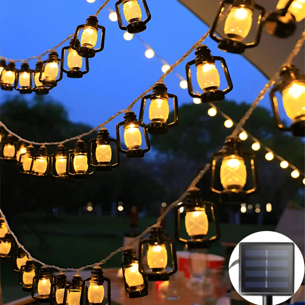 Solar String Lights - Outdoor LED Lanterns hanging in a garden with RGB and white colors, glowing warmly at dusk against the sky.
