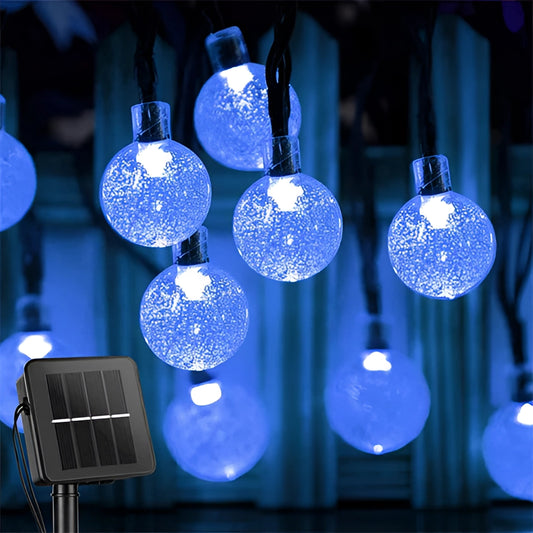 Blue Solar String Lights - Outdoor LED, 72ft with 200 LEDs, IP65 Waterproof, RGB/White Color, illuminating in electric blue.