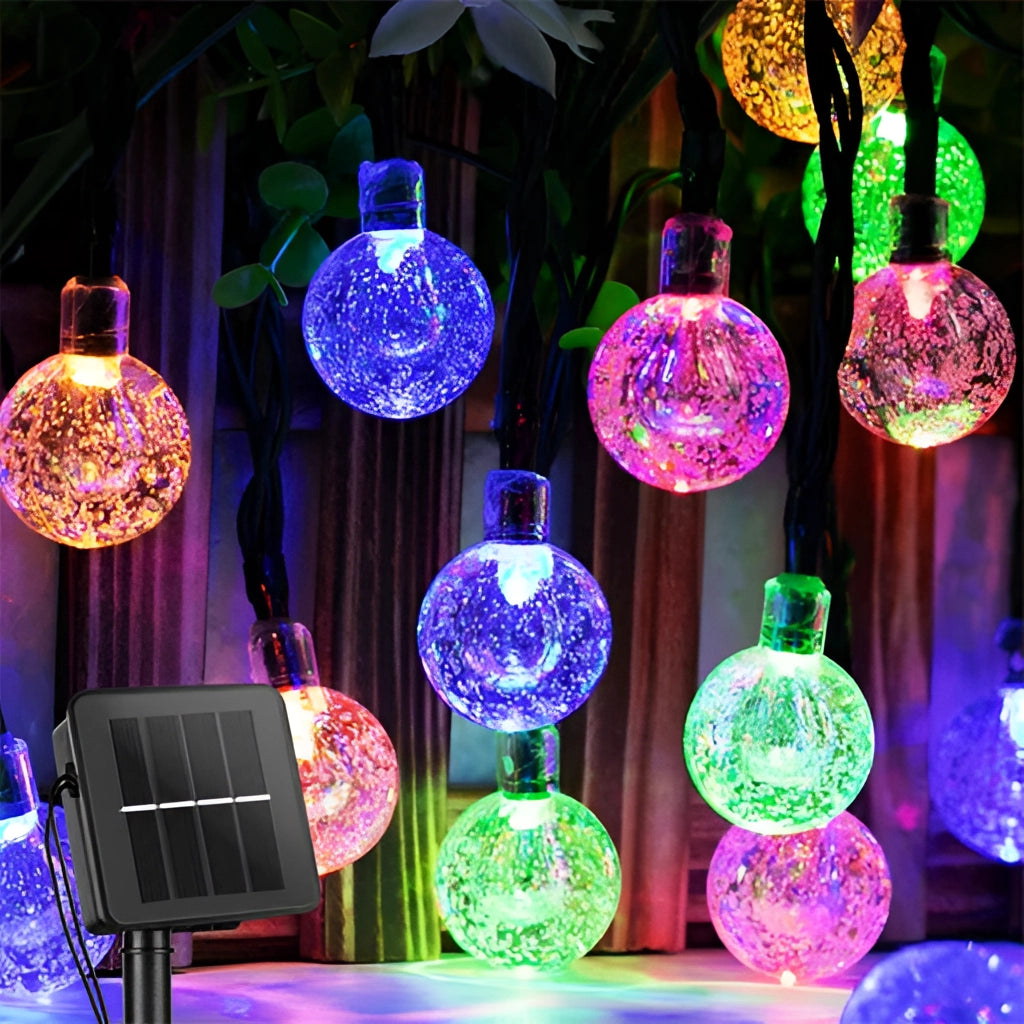 Solar String Lights - Outdoor LED, IP65 Waterproof, RGB/White Color, 72ft with 200 LEDs, glowing in blue, purple, and magenta shades, arranged in circular patterns.
