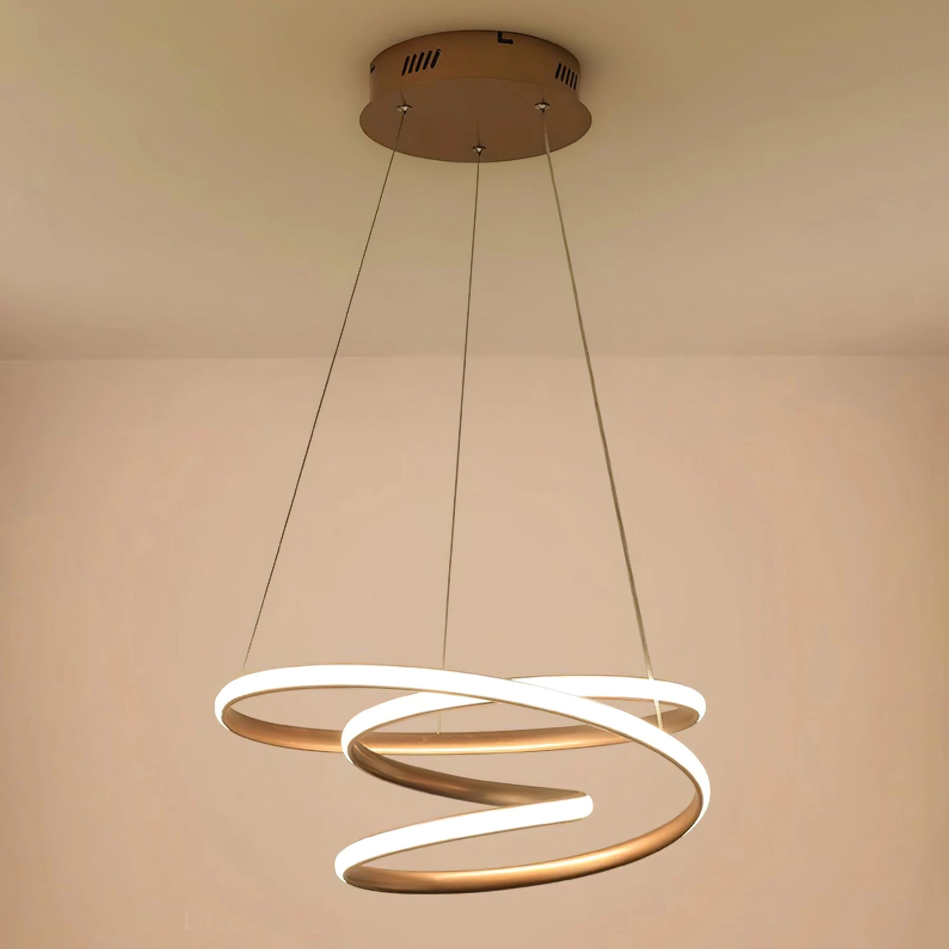Modern spiral pendant light with elegant design and warm illumination, featuring an aluminum body and hanging as a ceiling fixture.