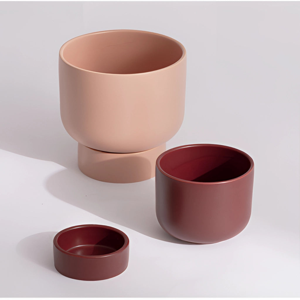 A ceramic stacked flower pot with multiple cylindrical sections, ideal for garden and bonsai arrangements.