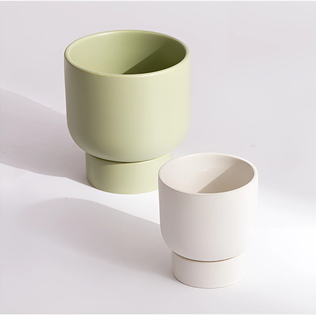 Ceramic stacked flower pot vase for garden and bonsai, cylindrical design, placed on a table.