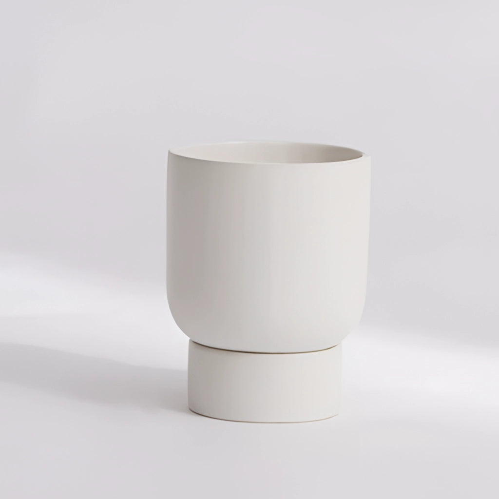 Pearl white small stacked flower pot ceramic vase for garden and bonsai on a table.