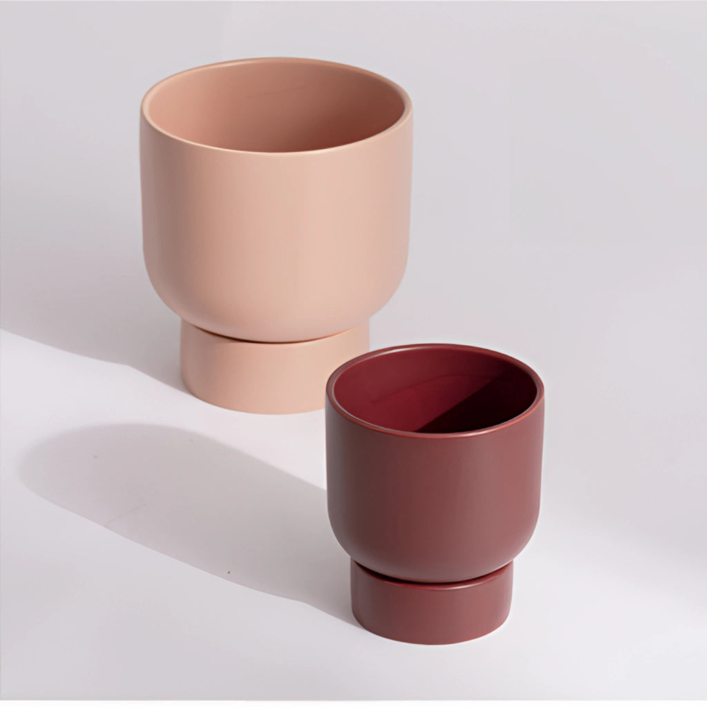 A ceramic stacked flower pot vase for garden and bonsai, shown on a table.