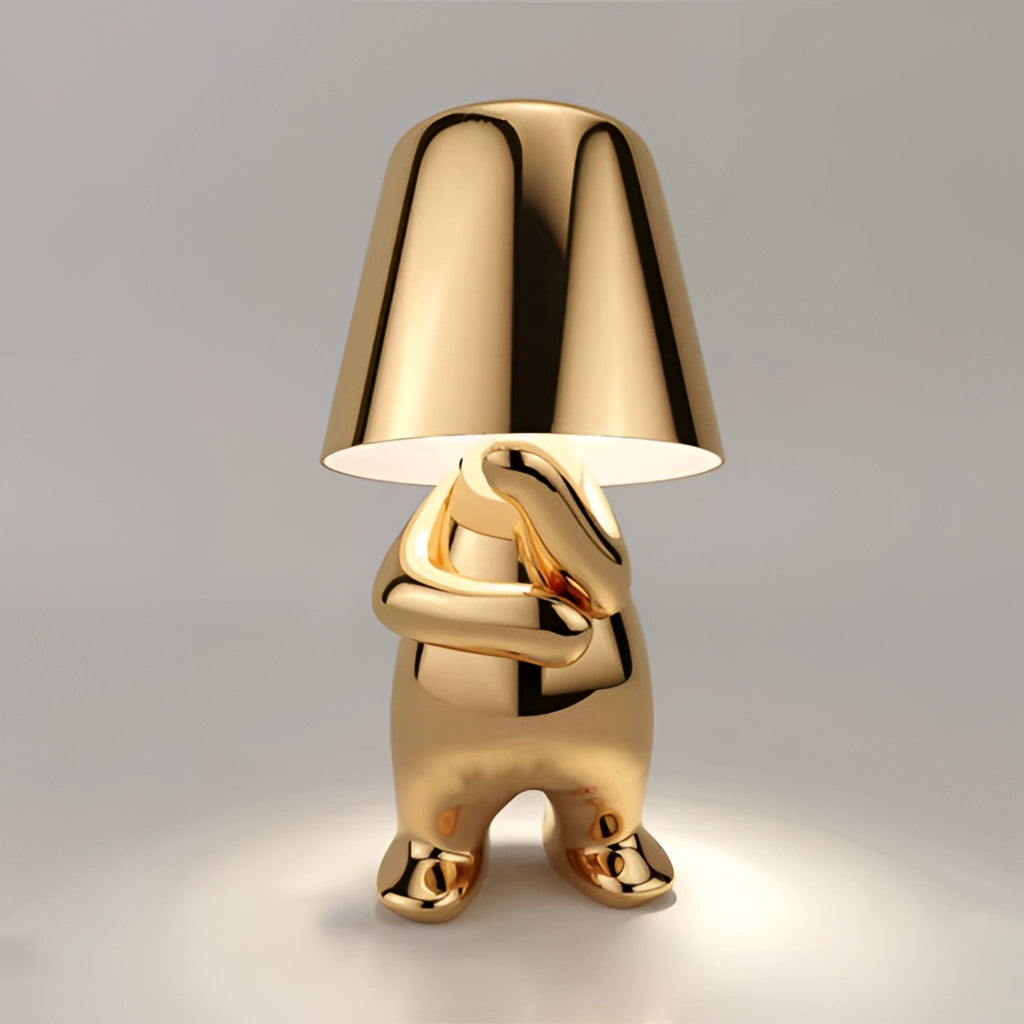Gold Stylish Thinker Lamp on a wooden base with a rectangular white lampshade, ideal for desk and nightstand lighting.