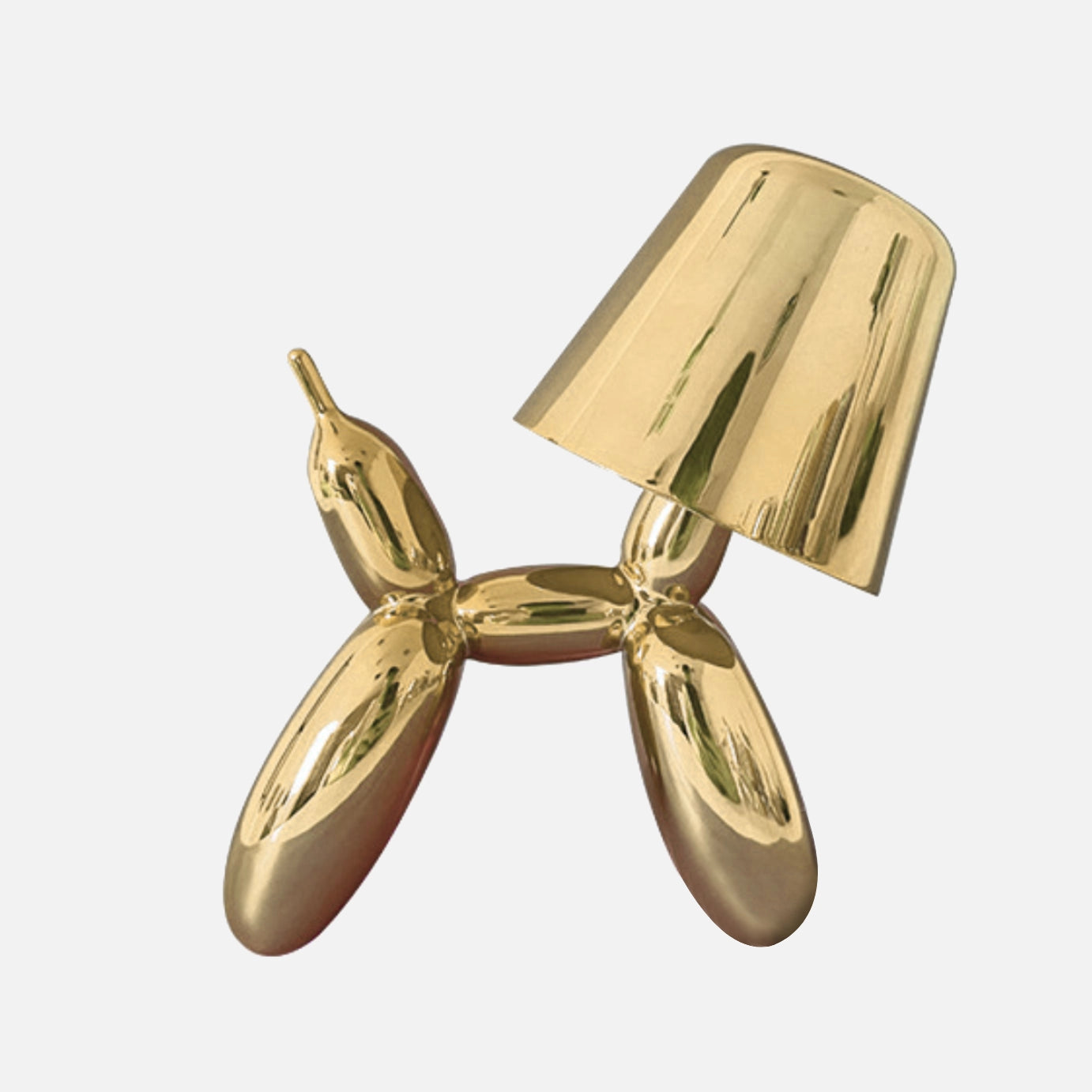 A gold table lamp featuring a touch-sensitive, dimmable crystal base with a whimsical balloon dog design.
