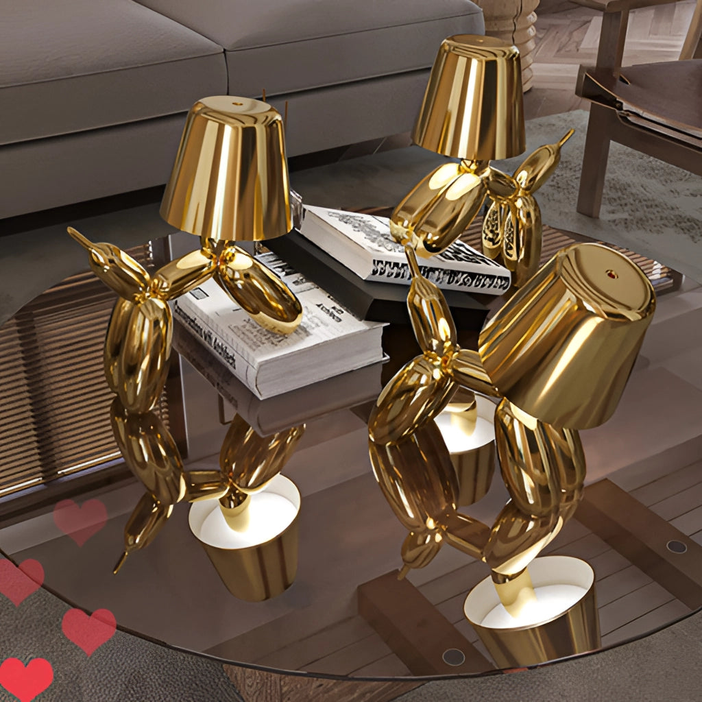 A crystal table lamp with a touch-sensitive dimmable feature, designed with a gold balloon dog base.