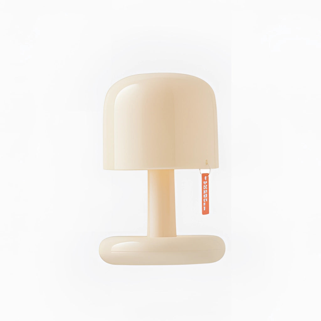 Ivory table lamp with touch switch and dimmable settings placed on a wooden table.