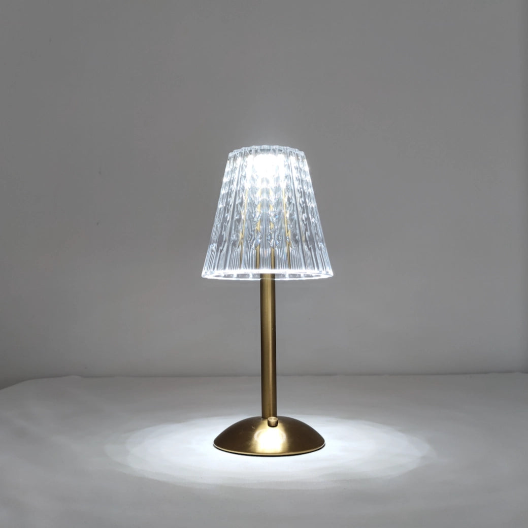 Modern tricolor dimmable cordless LED table lamp with a captivating view, featuring a sleek circular design, wooden base, and glass shade, emitting electric blue tints.