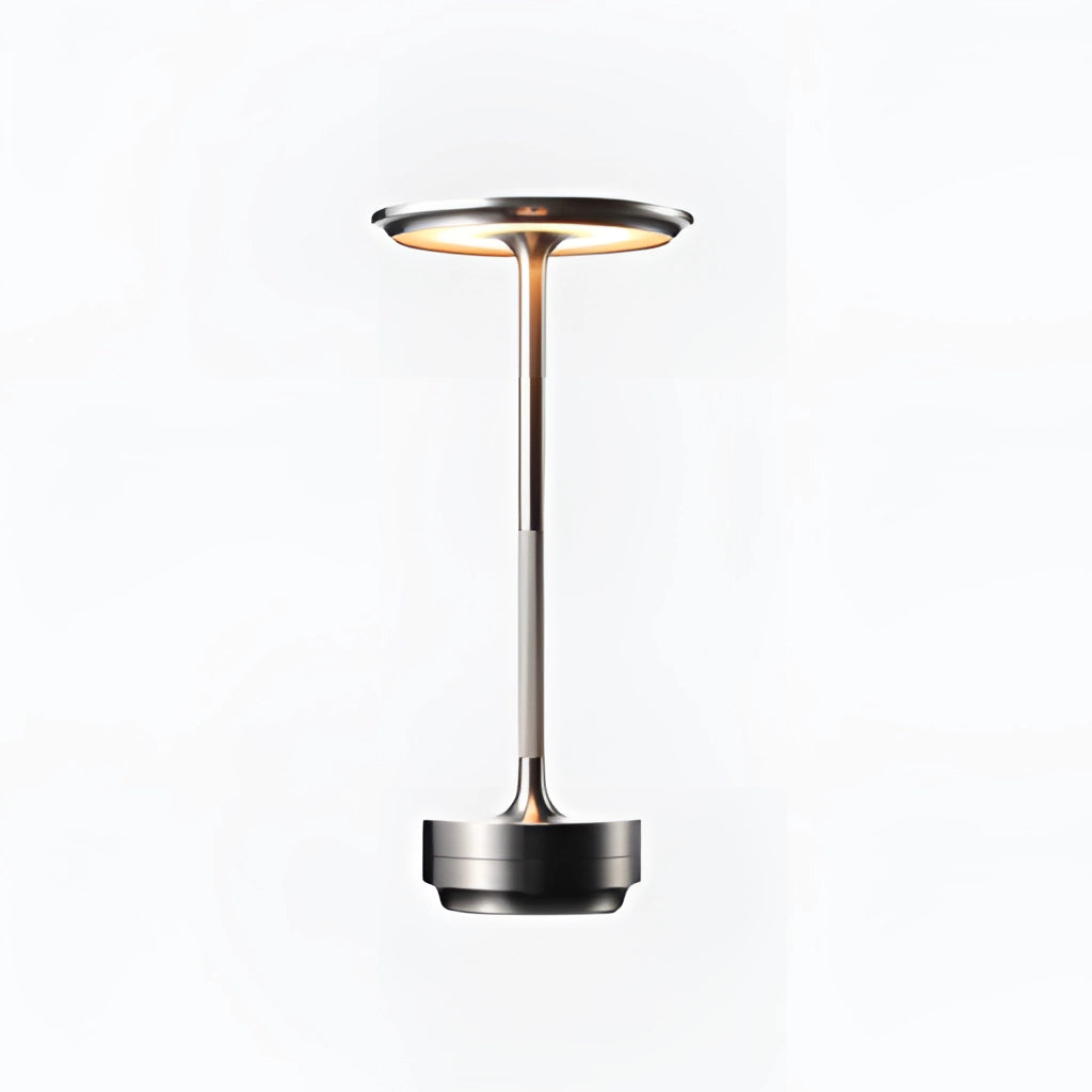 A sleek silver table lamp with a dimming feature, showcasing a masterful blend of metal and glass craftsmanship, set against a minimalist backdrop.