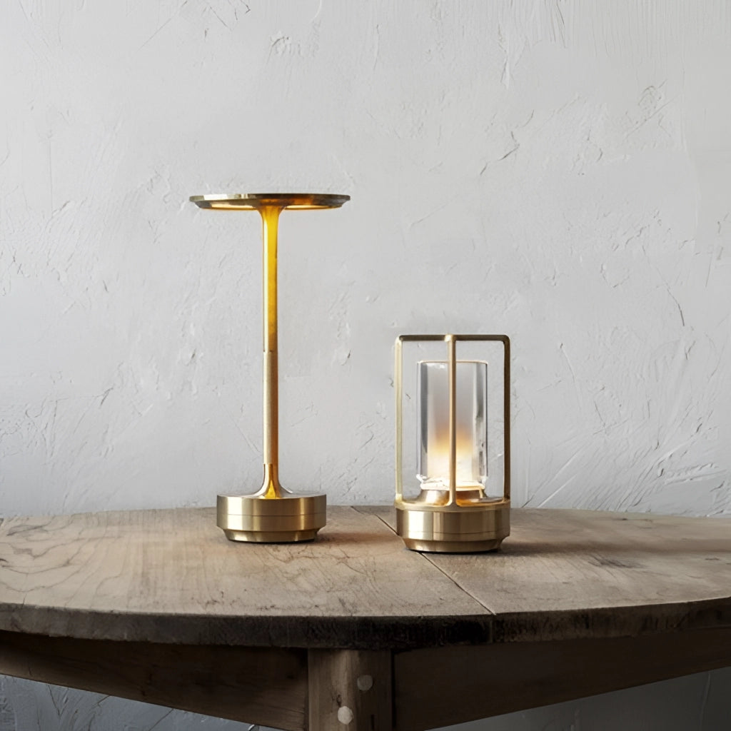 A wooden table lamp with a rectangular base, a cylindrical glass shade, and a metal frame, showcasing a dimming feature.