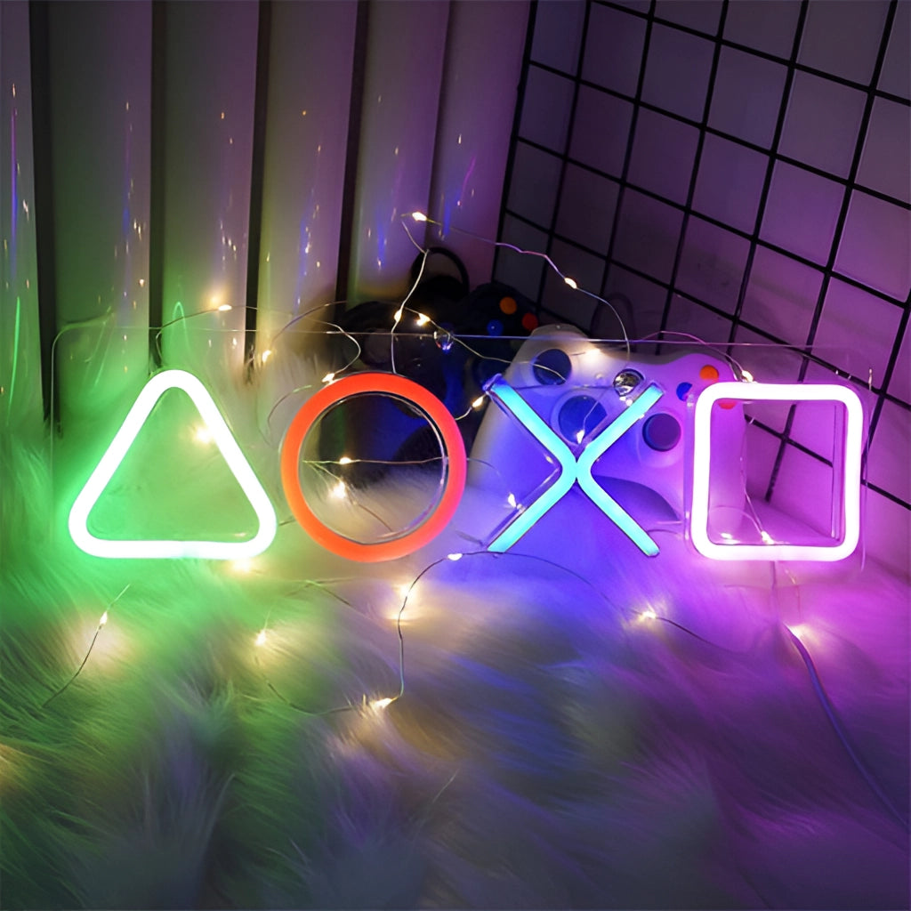 USB chargeable gaming icon neon lamp emitting purple and magenta light, placed on a desk near a plant, ideal for game room decor and night lighting.