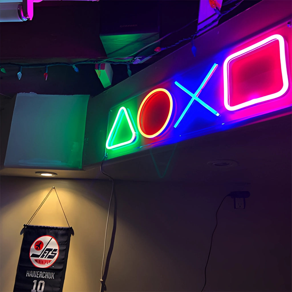 USB chargeable neon lamp shaped like a gaming icon, glowing in magenta light, ideal for game room decor and night lighting.