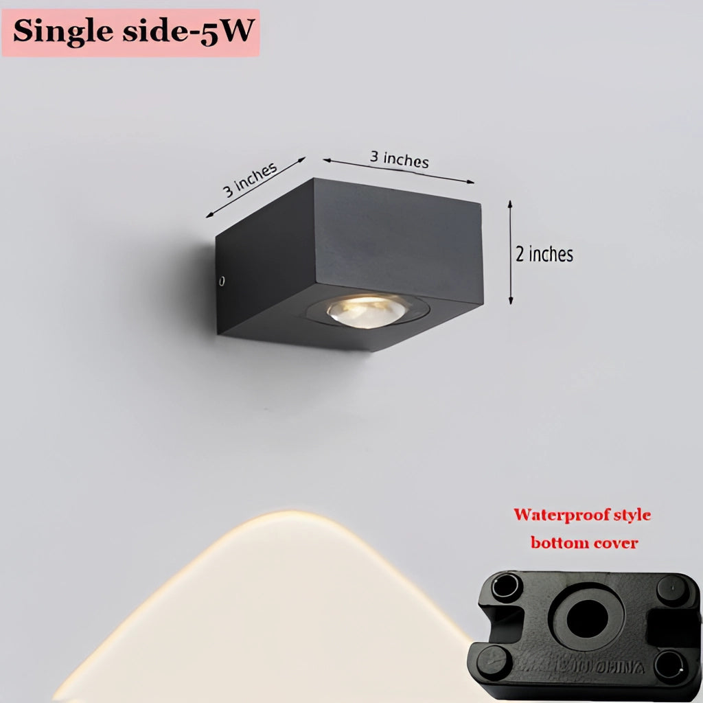 Waterproof black UFO-shaped wall light, one-sided design, featuring a sleek black aluminum body with a circular and rectangular form.