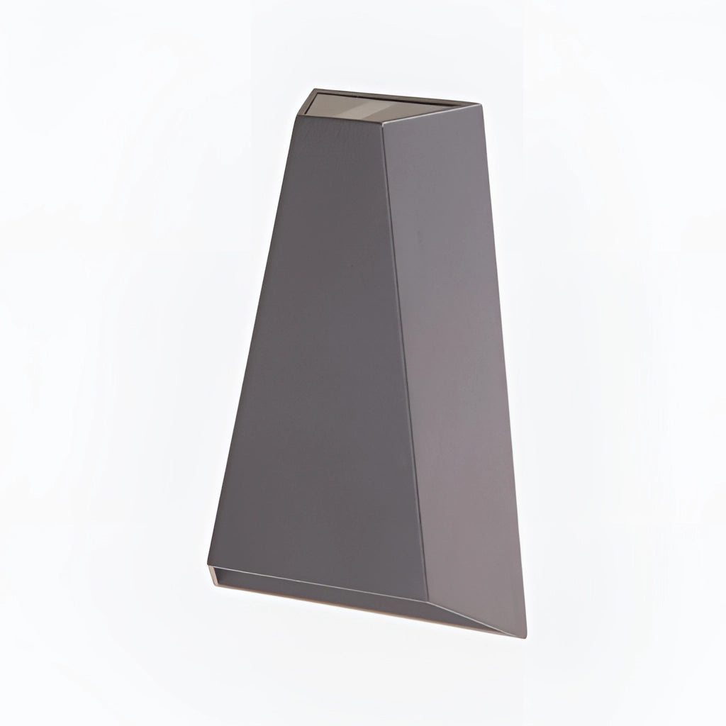 Gray Waterproof Outdoor Pyramid LED Wall Sconce emitting Warm White light, mounted on a wooden wall.