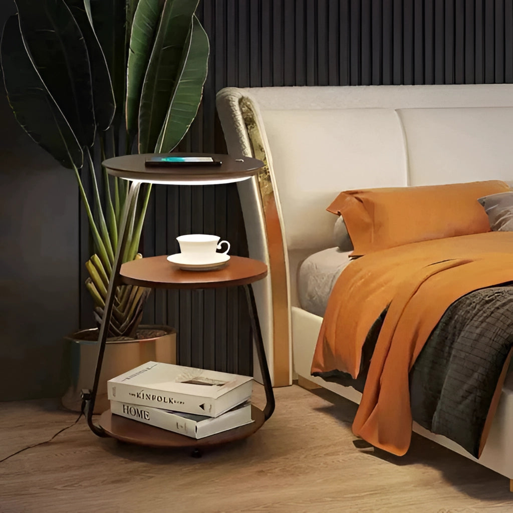 A modern wooden desk with integrated wireless charging, featuring a comfortable setup with a small plant, decorative pillows, and various textiles, designed for a stylish and efficient workspace.