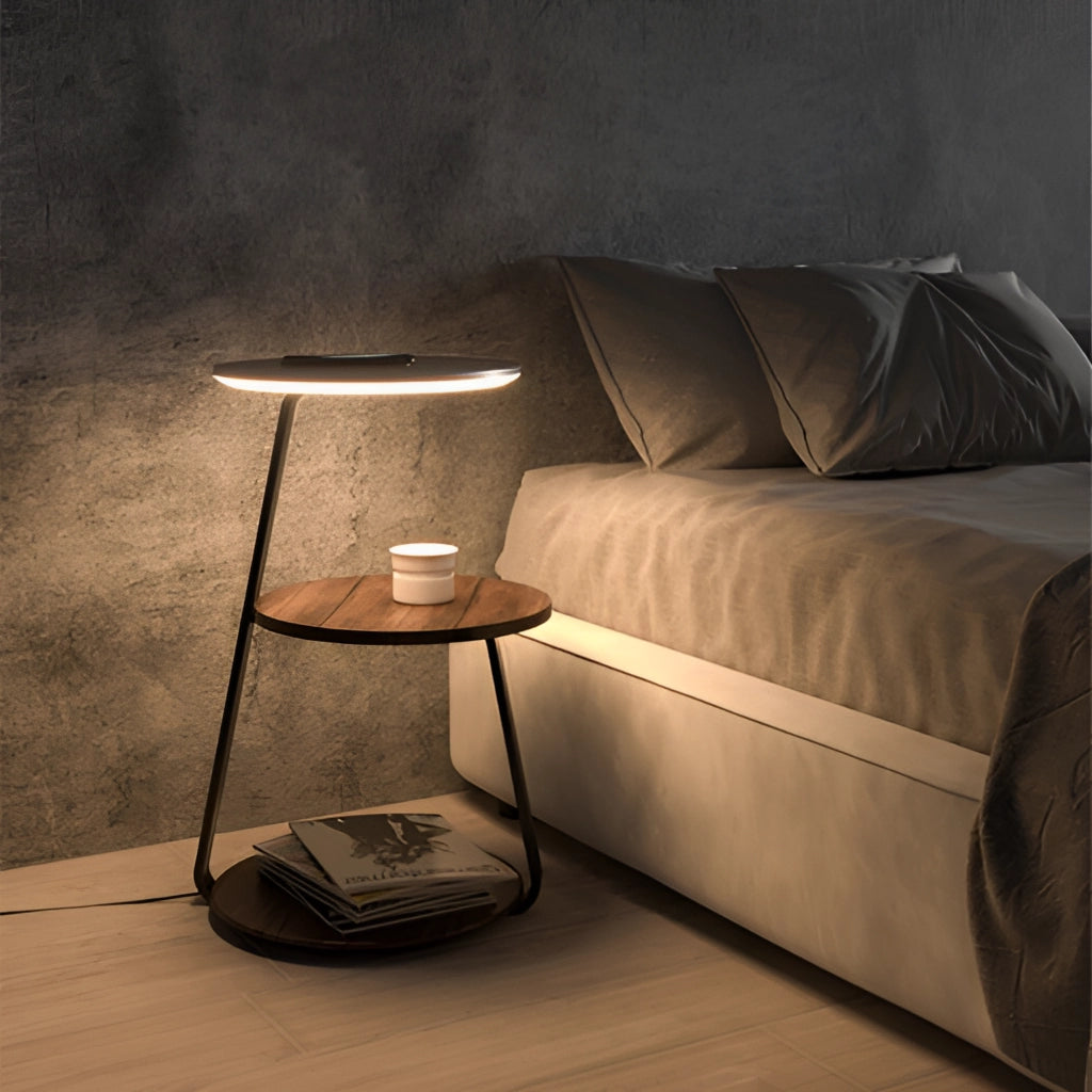 Wireless Charging Premium Desk in double walnut finish placed in a comfortable, well-lit living room with a modern couch and lamp, featuring wooden flooring and a rectangular design.