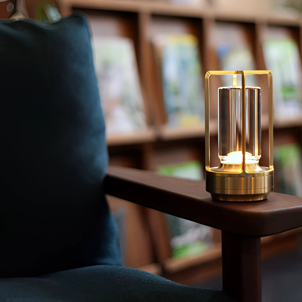 Wireless Crystal Lantern Table Lamp on a wooden table, emitting a warm glow, highlighting its glass and waterproof design.