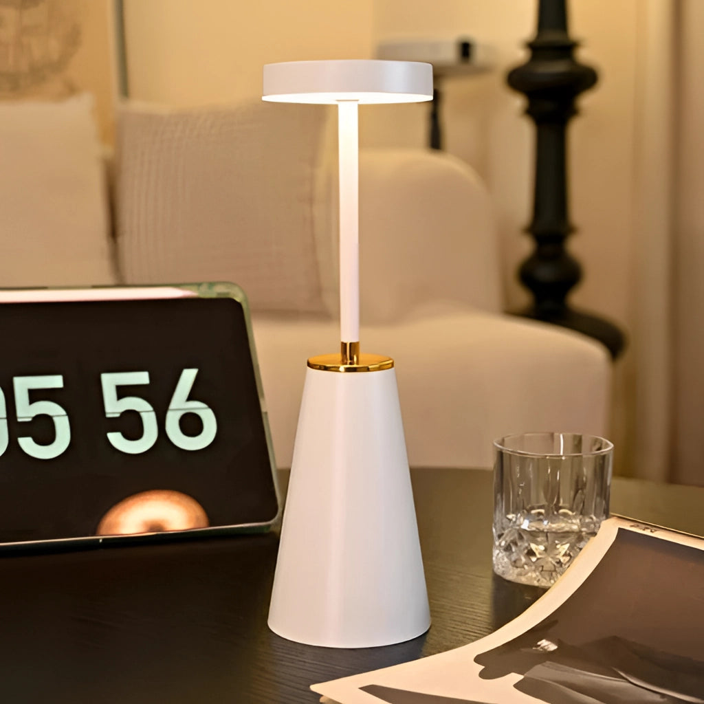 Wireless LED table lamp with touch technology on a wooden table, featuring an aluminum alloy body and adjustable three color dimming.