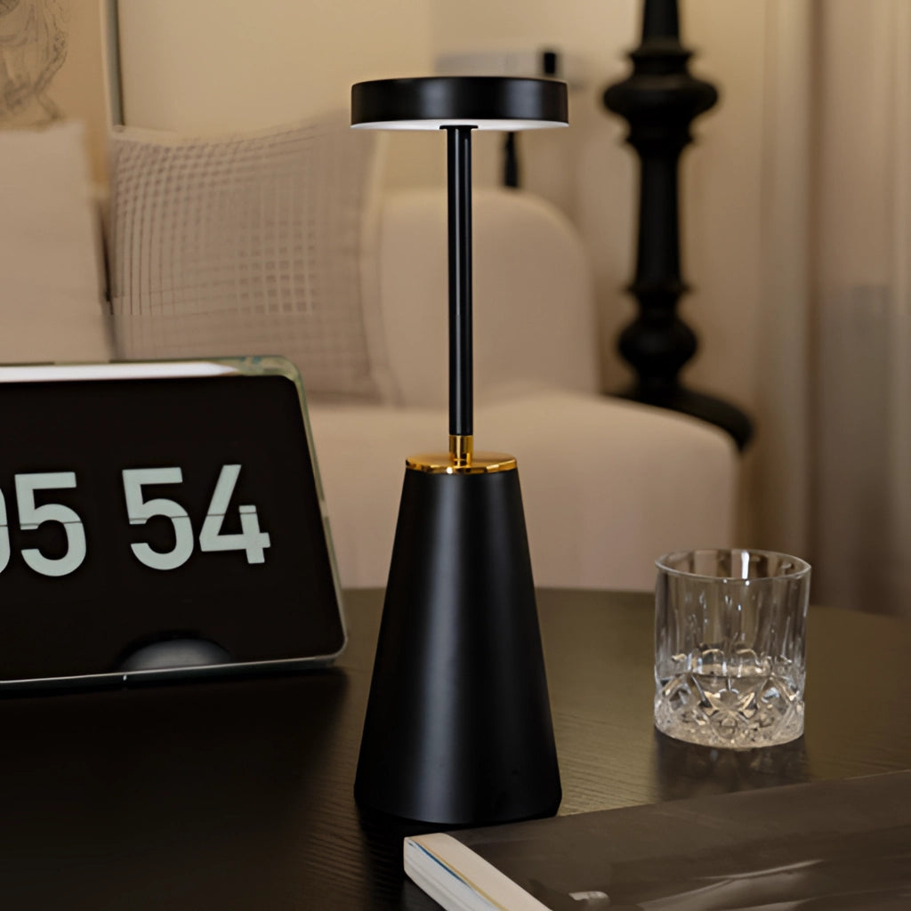 Wireless LED table lamp with touch technology on a wooden desk, featuring an aluminum alloy body with three color dimming options and a 4000mAh battery.