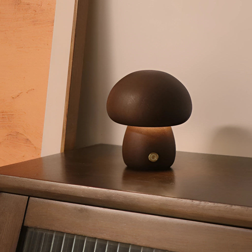 Wood Effect Mushroom Cordless Table Lamp in Dark Wood finish, Shroom Short variant, placed on a wooden shelf.