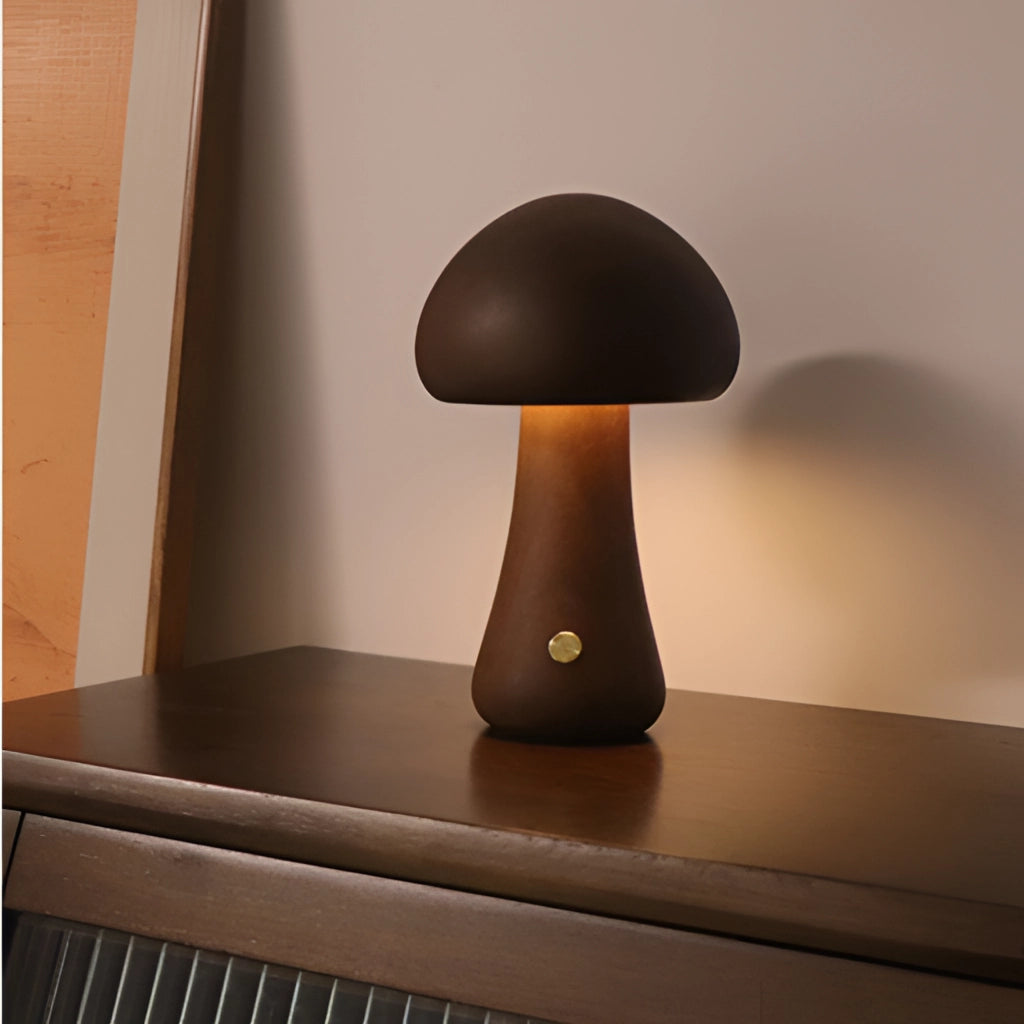 Wood effect mushroom cordless table lamp with flared tall design in dark wood finish, placed on a wooden table.