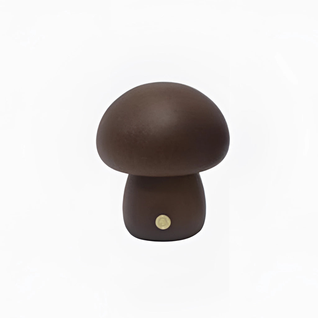 Wood Effect Mushroom Cordless Table Lamp on a table, featuring a mushroom-shaped head, oval design, and a natural wood finish.