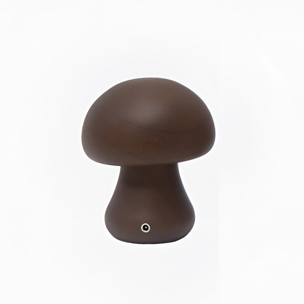 Wood effect cordless table lamp with a mushroom-shaped head, sitting on a table.