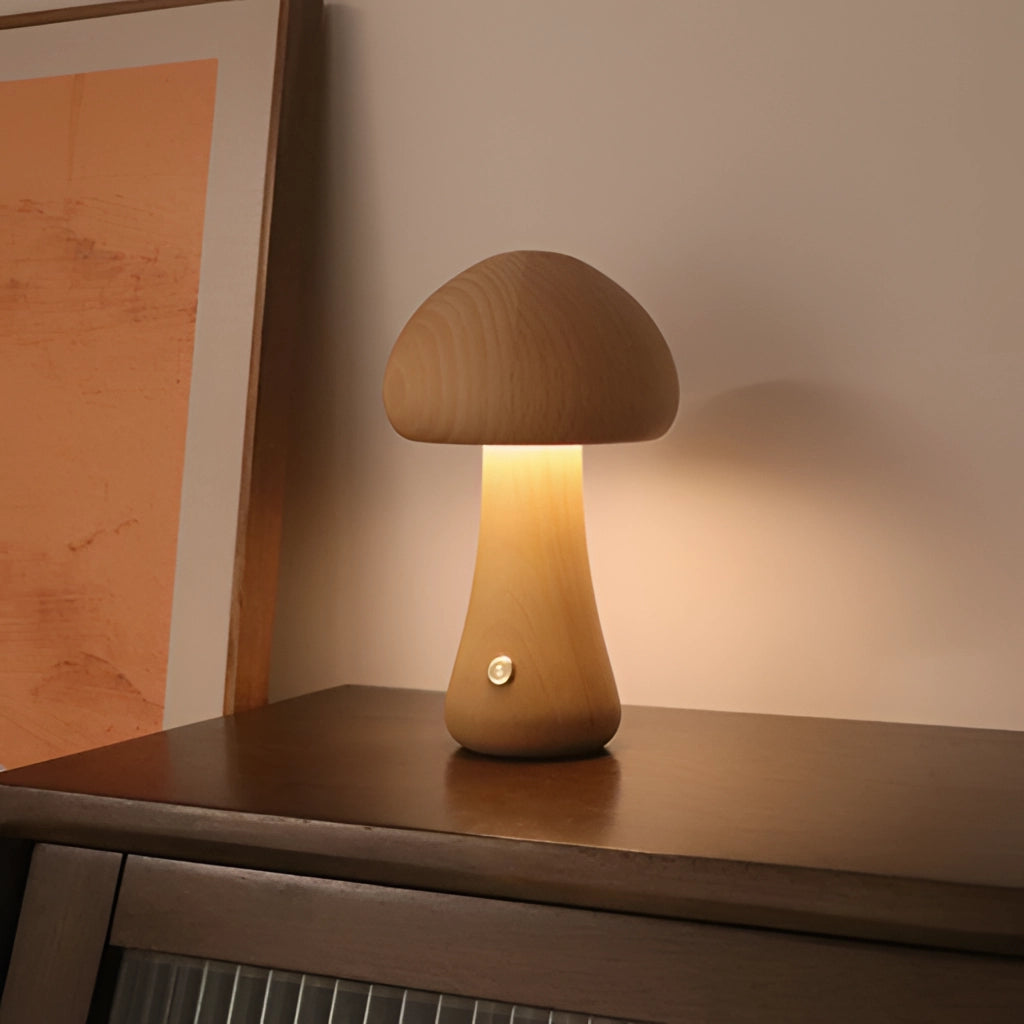 Wood effect mushroom cordless table lamp with flared tall design in natural wood finish, placed on a table in a cozy interior setting.