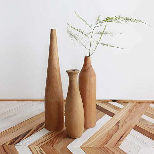 A tall wooden decor vase in brown color, suitable for holding plants or as a standalone decorative piece.